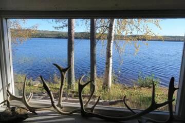 Фото номера Коттедж с 1 спальней Дома для отпуска Puolukkamaan Pirtit Cottages г. Lampsijärvi 21
