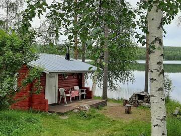 Фото номера Коттедж с 1 спальней Дома для отпуска Puolukkamaan Pirtit Cottages г. Lampsijärvi 26