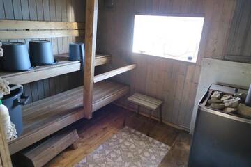Фото номера Коттедж с 1 спальней Дома для отпуска Puolukkamaan Pirtit Cottages г. Lampsijärvi 23