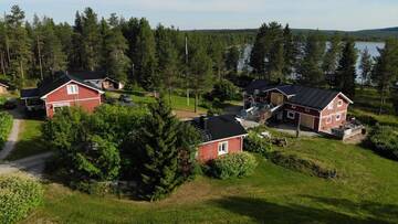 Фотографии Дома для отпуска Puolukkamaan Pirtit Cottages г. Lampsijärvi (Финляндия) №3 Фото Дома для отпуска Puolukkamaan Pirtit Cottages г. Lampsijärvi 3